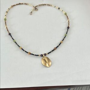 Gold and Black Beaded Necklace with Circular Pendant